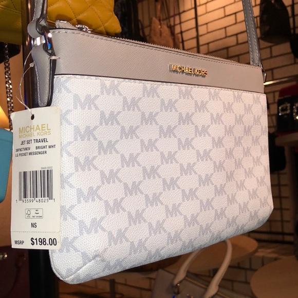 Michael Kors Handbags - 💥$3 MK NWT WHITE CROSSBODY